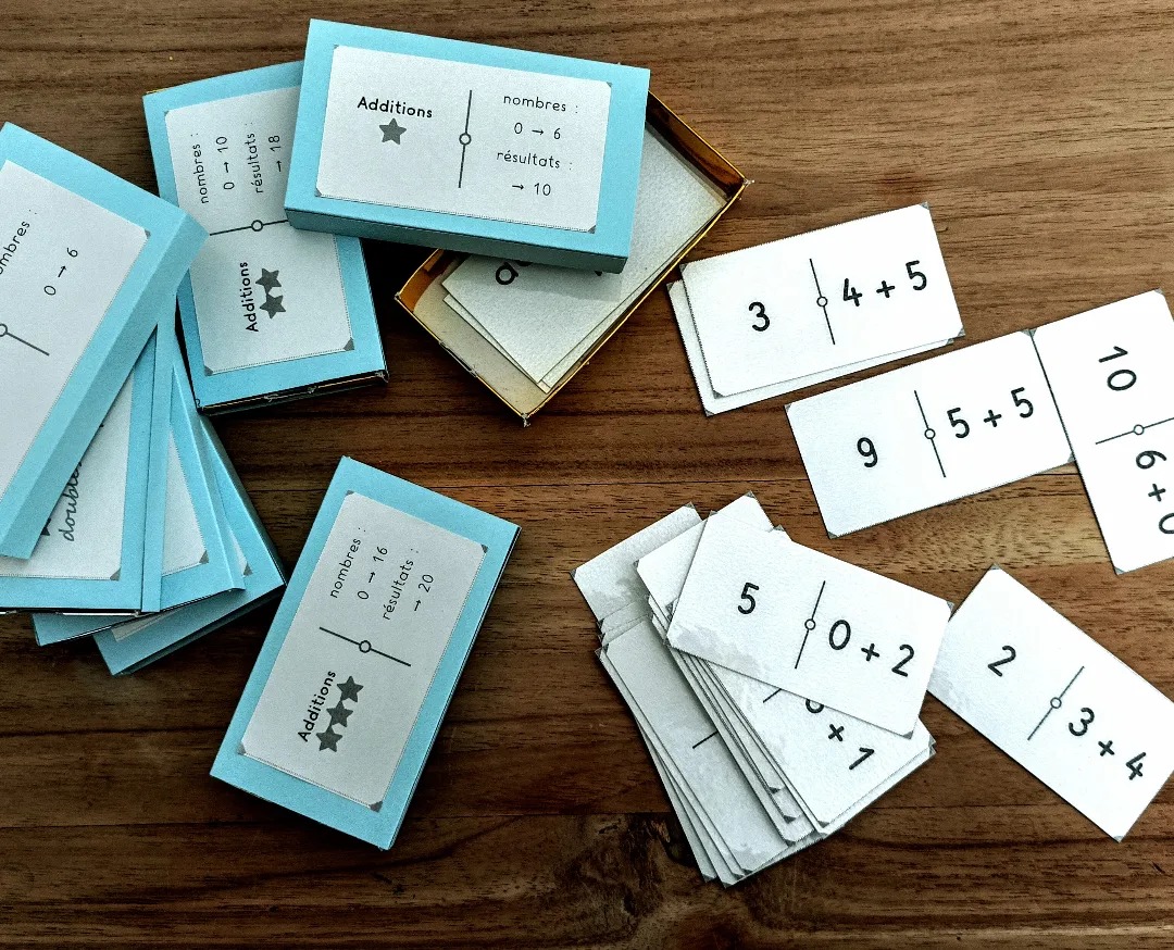 Jeux de dominos mathématiques et leurs boites de rangement